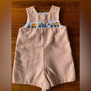 Orange and white checkered smocked construction trucks jumper